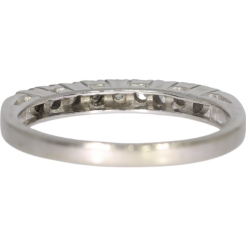 114 - 14ct white gold CZ half eternity ring. Size N. Weight 2.6g. Stamped 585 and tested as 14ct gold and ... 