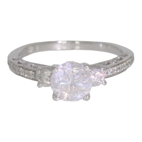 119 - 18ct gold diamond single-stone ring, with diamond shoulders.  Set with a principle brilliant cut dia... 