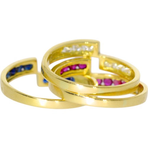 126 - 18ct gold ruby, sapphire & diamond three ring stack. 8.8 Grams. Set with round mixed cut rubies, sap... 