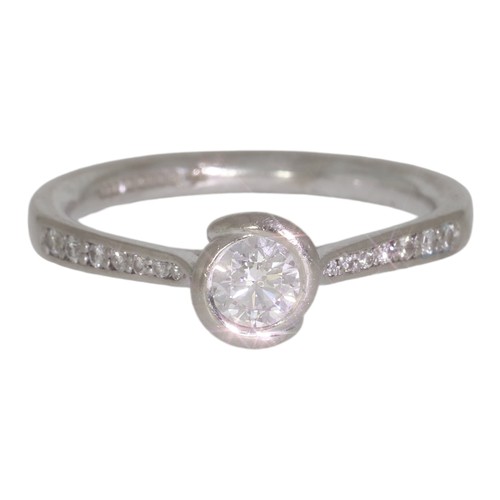 139 - 18ct white gold diamond single-stone ring, with diamond shoulders.  Set with a principle brilliant c... 