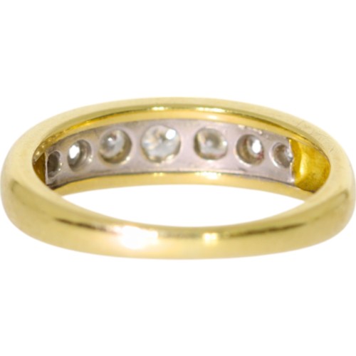 254 - An 18ct yellow gold diamond half-eternity ring. Set with brilliant cut diamonds of 0.90ct total calc... 