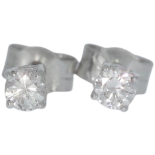 381 - 18ct white gold diamond single-stone earrings. Set with brilliant cut diamonds of 0.24ct total calcu... 