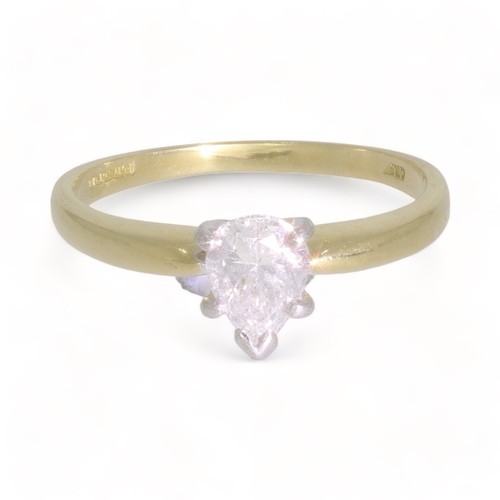 A 18ct yellow and white gold single stone diamond ring
1 stone, Pear cut. Colour: I/J. Clarity: SI2/PI. (assessed)
Length 6.75mm; width 5.10mm; depth 3.60mm
Girdle: v thick faceted
Weight 0.81ct (estimated)
White metal, Claw Yellow metal, Tapering. Polished
Yellow metal, 'D' section. Polished. Width 2.3mm; depth 0.8mm
Gross Weight 3.16 grams. Manufacture: Assembled casting Hallmarked, Gold, 18ct, London 1994. Maker/Sponsor: CRF