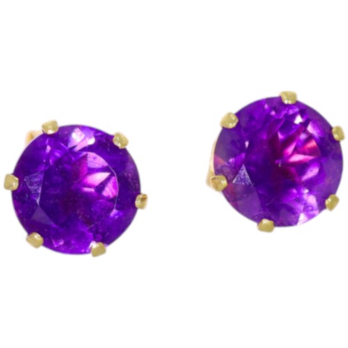 277 - 9ct yellow gold and purple synthetic stud earrings. 0.70g