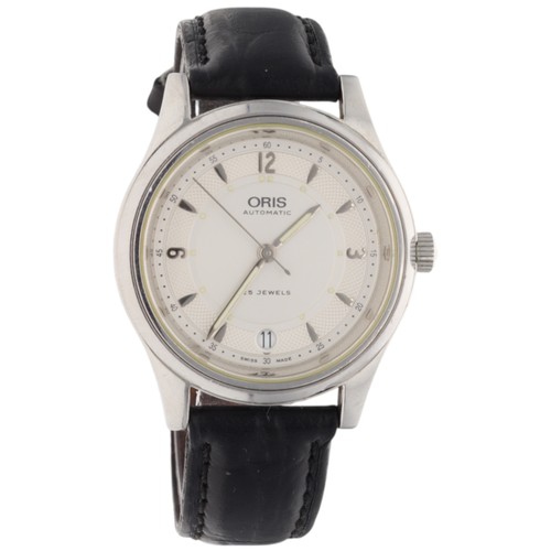 Oris Automatic 7490

An Oris automatic wristwatch, reference 7490, dating from 2002. 

This timepiece features a polished stainless steel case and a classic silvered dial with Arabic numeral hour markers. 

It is presented on a black leather strap.

This watch comes complete with its original box and papers.
