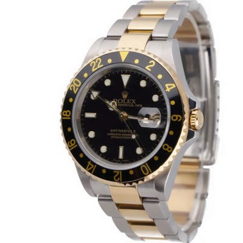 47 - A striking Rolex GMT-Master II automatic wristwatch, reference 16713,
manufactured in 2004. This des... 