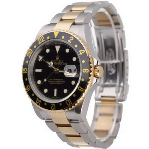 47 - A striking Rolex GMT-Master II automatic wristwatch, reference 16713,
manufactured in 2004. This des... 
