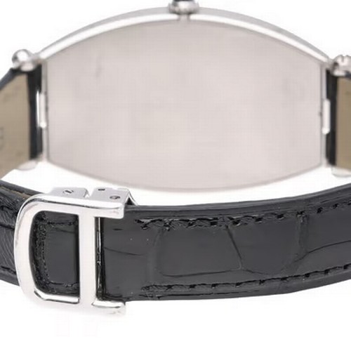 67 - A rare and elegant Cartier Tonneau manual wind wristwatch, reference 2435,
manufactured in 2003. Thi... 