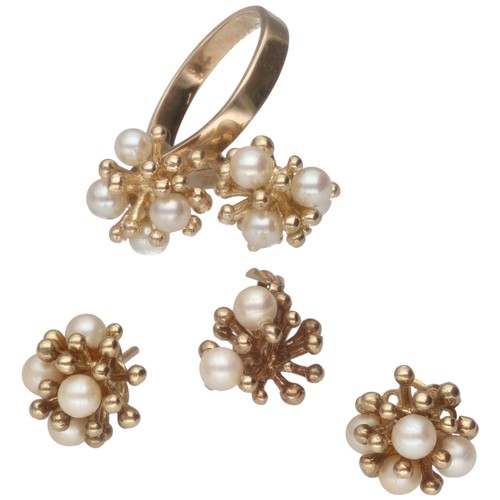 Yellow Metal Tested 9ct Cultured Pearl Ring Earring And Pendant Set Ring 4.6 Grams Pendant 1.4 Grams Earrings 3.5 Grams

A 9ct Yellow Gold and Cultured Pearl Demi-Parure

Description:
A charming demi-parure crafted in 9ct yellow gold, featuring a ring, a pair of stud earrings, and a pendant, all designed in a distinctive organic, coral-like cluster motif. Each piece is set with lustrous cultured pearls, offering a classic yet contemporary aesthetic. The ring weighs approximately 4.6 grams. This matching set presents an elegant and versatile addition to any jewellery collection.

Composition: 9ct Yellow Gold, Cultured Pearls
Weight: Ring 4.6 grams (total weight of earrings and pendant