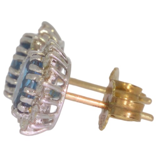 70 - 9ct gold topaz and diamond cluster earrings. Set with two oval blue topaz, and brilliant cut diamond... 