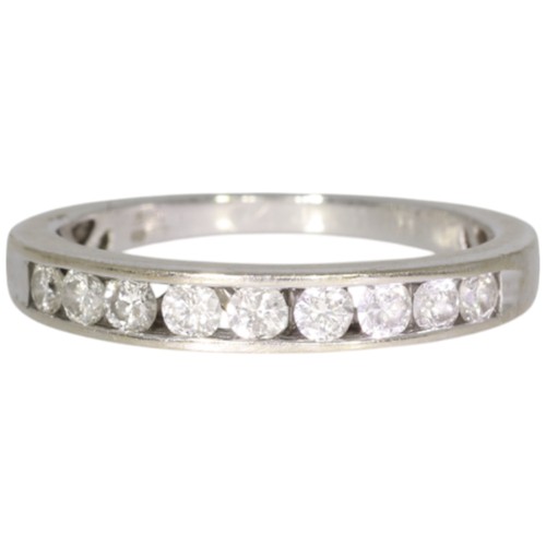 An 18ct white gold diamond half-eternity ring. Set with brilliant cut diamonds of 0.35ct total calculated weight, assessed as G/H colour, I clarity. Size K. Weight 2.2g. Hallmarked London. Good, wearable condition.

Good, wearable condition.
