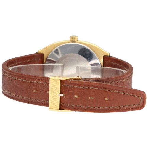 20 - Girard-Perregaux wristwatch, reference 4253-TA, featuring a gold-plated tonneau-shaped case. 

This ... 
