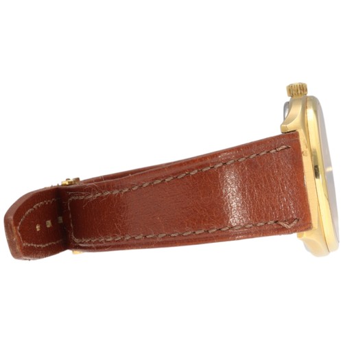 20 - Girard-Perregaux wristwatch, reference 4253-TA, featuring a gold-plated tonneau-shaped case. 

This ... 