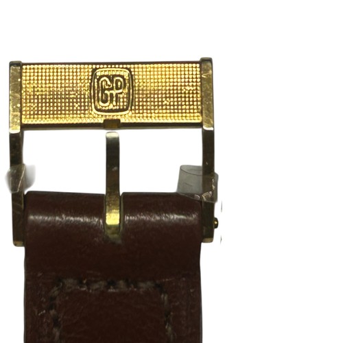 20 - Girard-Perregaux wristwatch, reference 4253-TA, featuring a gold-plated tonneau-shaped case. 

This ... 