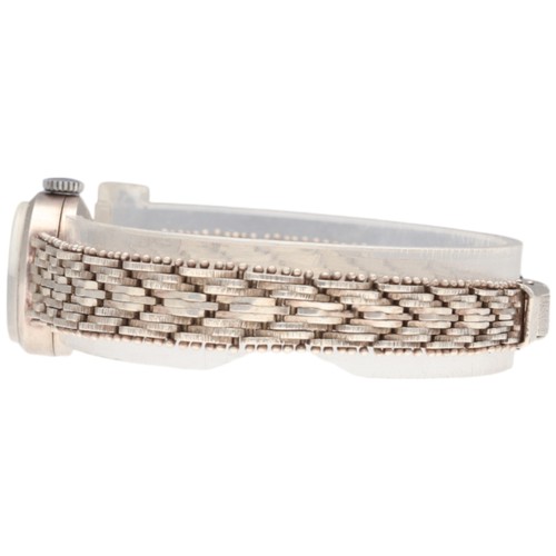 39 - A lady's sterling silver Mayfair wristwatch, dating to circa 1994. The watch features a circular cre... 