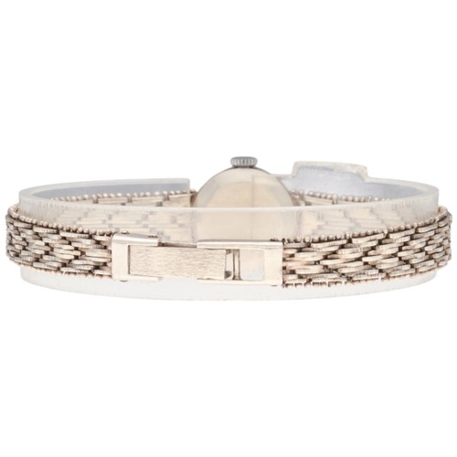 39 - A lady's sterling silver Mayfair wristwatch, dating to circa 1994. The watch features a circular cre... 
