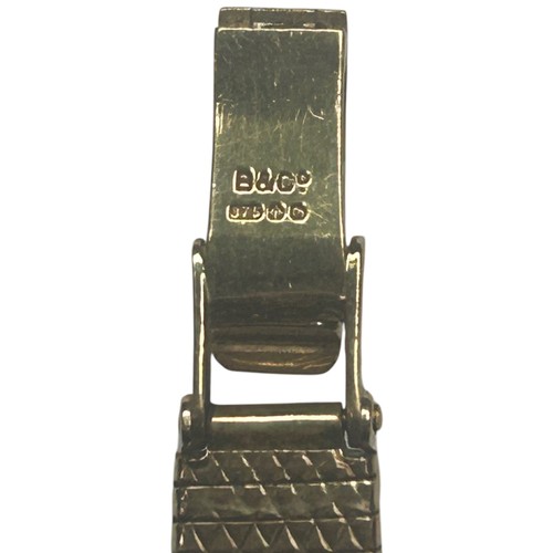 30 - A vintage ladies' 9ct gold Longines manual wind wristwatch, circa 1970. The cushion-shaped dial with... 