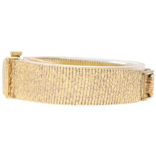 8 - Bucherer Ladies' Dress Watch – Textured Bracelet
Movement: Swiss Manual Wind (likely 17-Jewel)
Mater... 