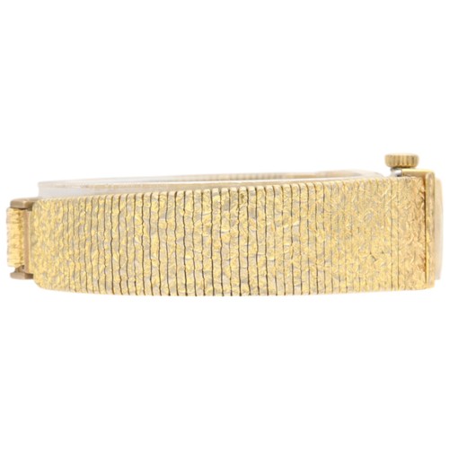 8 - Bucherer Ladies' Dress Watch – Textured Bracelet
Movement: Swiss Manual Wind (likely 17-Jewel)
Mater... 