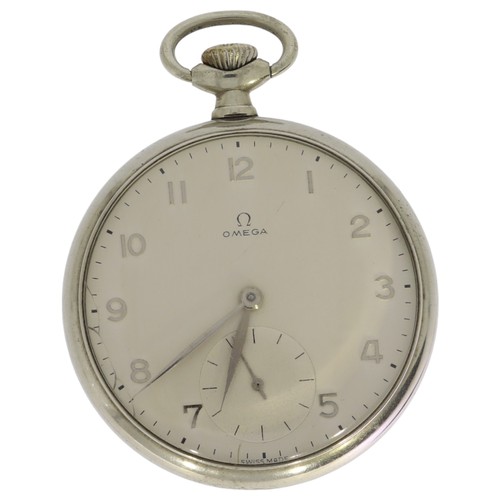Omega open-face pocket watch, reference 141-65, dating to 1964. The 48mm nickel-chrome case houses a 15-jewel manual-wind Calibre 161 movement and features a matte silver dial with Arabic numerals and a subsidiary seconds sub-dial.

Maker: Omega

Origin: Switzerland

Material: Nickel-Chrome

Period: 1964

Dimensions: 48mm Diameter

Condition: [To be verified; images suggest excellent preservation with original dial finish].

Short Pitch: A quintessential mid-century Omega, this Ref. 141-65 combines a legendary workhorse movement with an elegantly minimalist dial. One of the final iterations of a design that spanned four decades of Swiss horological history.