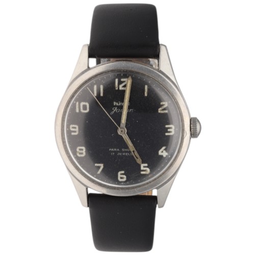 HMT Jawan – Indian Military Issue – Ref. 6645-000035
Movement: HMT 17-Jewel Manual Winding (In-House 0231 movement)
Materials: Brushed Stainless Steel Case
Dial: Matte Black with luminous Arabic hour markers and white track.
Bezel: Fixed, integrated slim profile.
Condition: Good; dial shows attractive vintage "patina"; case retains sharp military lines.
Full Set: No (Watch only; typically paired with a black or olive NATO strap).

Description:
A true piece of horological history, the HMT Jawan (Hindi for "Soldier") was the official field watch of the Indian Armed Forces from the 1970s through the 1990s. This Reference 6645-000035 features the essential MoD markings and "broad arrow" caseback, signifying its government heritage. With its compact 35mm case and reliable 17-jewel mechanical heart, it offers the quintessential military "broad arrow" experience at an accessible price point