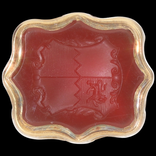 201 - A Historically Significant Late Victorian 9ct Gold and Carnelian Heraldic Fob Seal
A substantial and... 