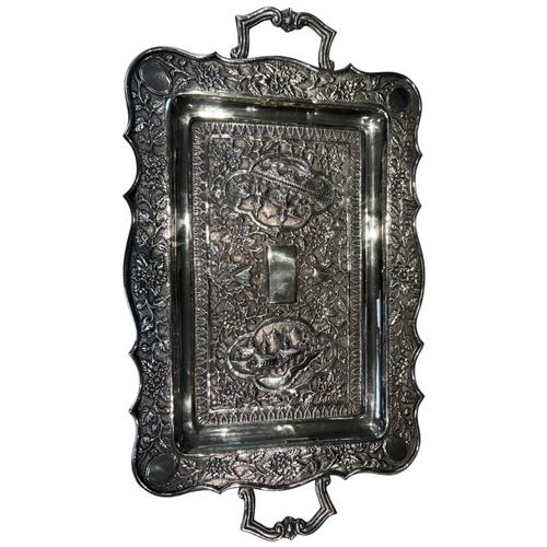 239 - A large mid-20th century Persian (Iranian) silver tray, likely Isfahan. Of rectangular form with rou... 