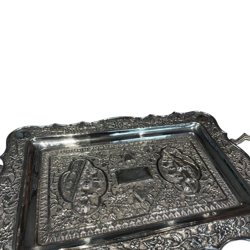 239 - A large mid-20th century Persian (Iranian) silver tray, likely Isfahan. Of rectangular form with rou... 