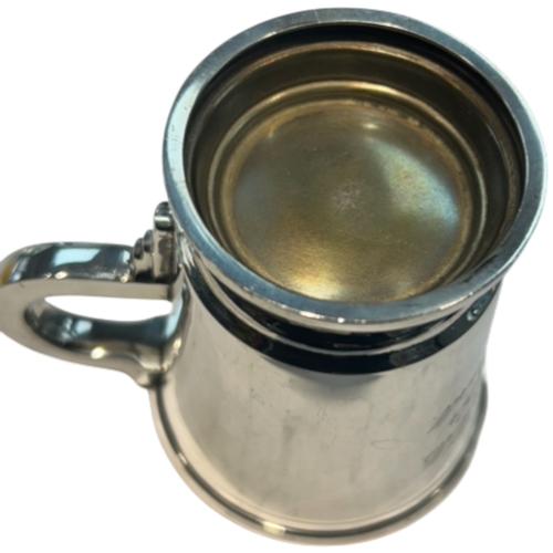 243 - A George VI sterling silver christening cup or small mug, hallmarked Birmingham, 1938, by A. L. Dave... 