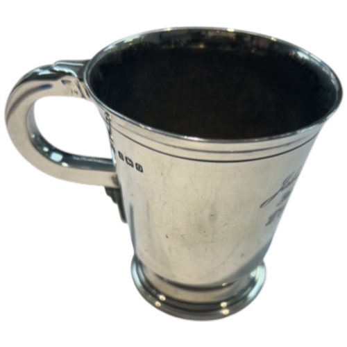 243 - A George VI sterling silver christening cup or small mug, hallmarked Birmingham, 1938, by A. L. Dave... 