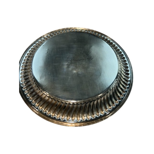 247 - A modern sterling silver drinks coaster, hallmarked Birmingham, 1998. The circular coaster features ... 