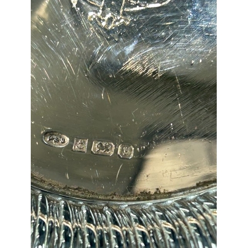 247 - A modern sterling silver drinks coaster, hallmarked Birmingham, 1998. The circular coaster features ... 