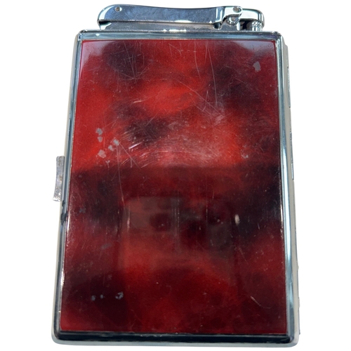 254 - A sophisticated Mid-Century Colibri combination lighter and cigarette case, circa 1950. Finished in ... 