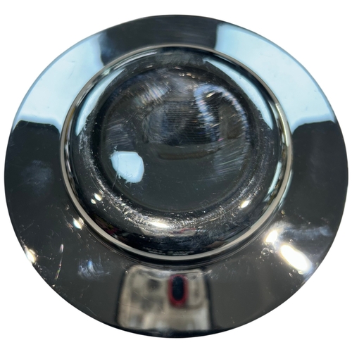 256 - A modern Elizabeth II sterling silver dish of circular form, featuring a broad rim and a deep, polis... 