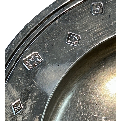 258 - An Elizabeth II sterling silver presentation dish of substantial gauge and circular form. The piece ... 
