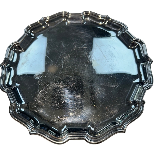 261 - An Elizabeth II sterling silver salver of circular 