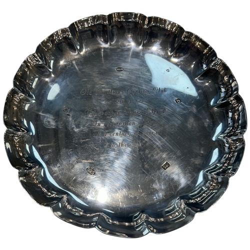 263 - n Elizabeth II sterling silver salver of circular form with a traditional 