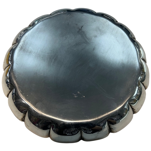 263 - n Elizabeth II sterling silver salver of circular form with a traditional 