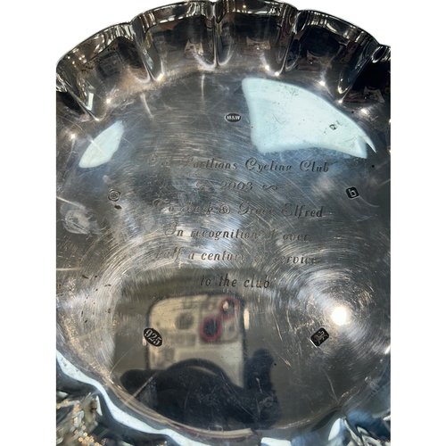 263 - n Elizabeth II sterling silver salver of circular form with a traditional 