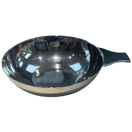 270 - An Edwardian sterling silver cream or bon-bon bowl of deep circular form, featuring a high-mirror fi... 