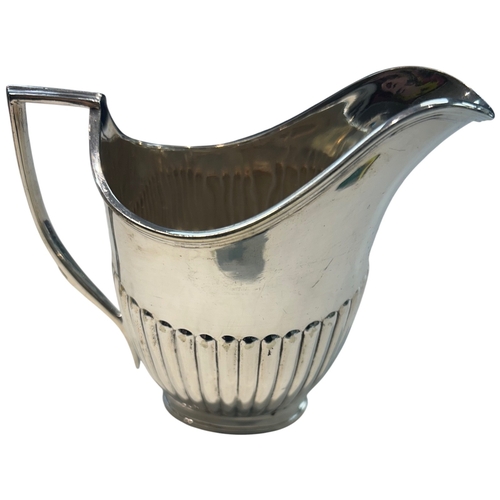 274 - An Early 20th Century Silver-Plated Cream Jug A silver-plated (EPNS) cream jug featuring a classic N... 