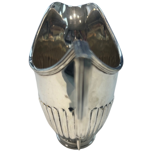274 - An Early 20th Century Silver-Plated Cream Jug A silver-plated (EPNS) cream jug featuring a classic N... 