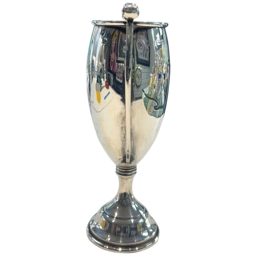 275 - A fine WWI-era sterling silver sports trophy, hallmarked London, 1913. Of traditional two-handled fo... 
