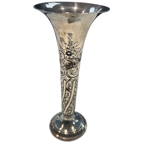 278 - An Edwardian sterling silver trumpet vase of slender form, featuring a flaring rim and a weighted ci... 