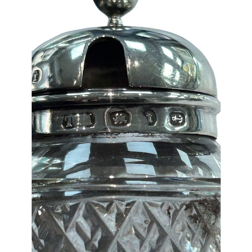 289 - A charming collection of three late Victorian and Edwardian silver-mounted glass vanity jars by the ... 