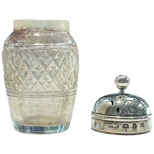 289 - A charming collection of three late Victorian and Edwardian silver-mounted glass vanity jars by the ... 