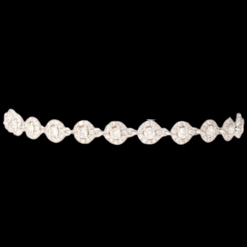 70 - White Metal Stamped And Tested 750 Diamond Halo Bracelet Weight 5.9 Grams Length 7 Inch  Set with br... 