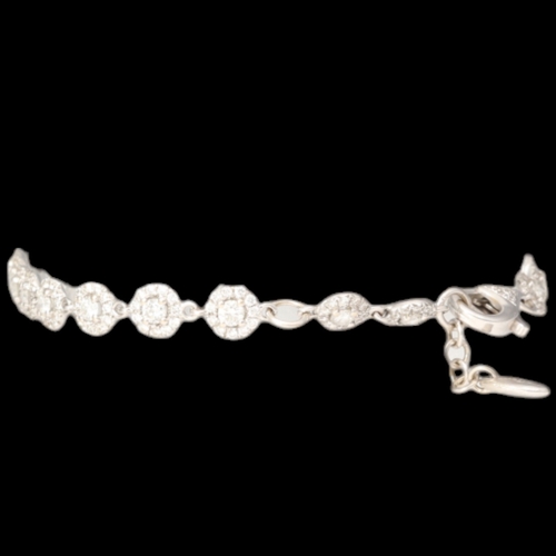 70 - White Metal Stamped And Tested 750 Diamond Halo Bracelet Weight 5.9 Grams Length 7 Inch  Set with br... 