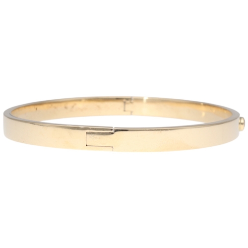 72 - Yellow Metal Tested 14ct Hingled Bangle With Diamond Weight 35.55 Grams inside diameter 71mm  Set wi... 