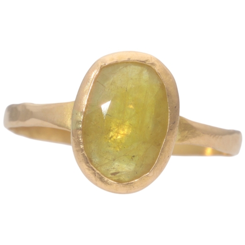 74 - Yellow Metal Tested 22ct Yellow Stone Ring Weight 3.85 Grams Finger Size Z +1  Set with a oval yello... 